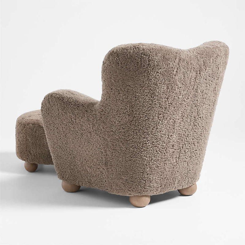 Brown textured armchair on a white background