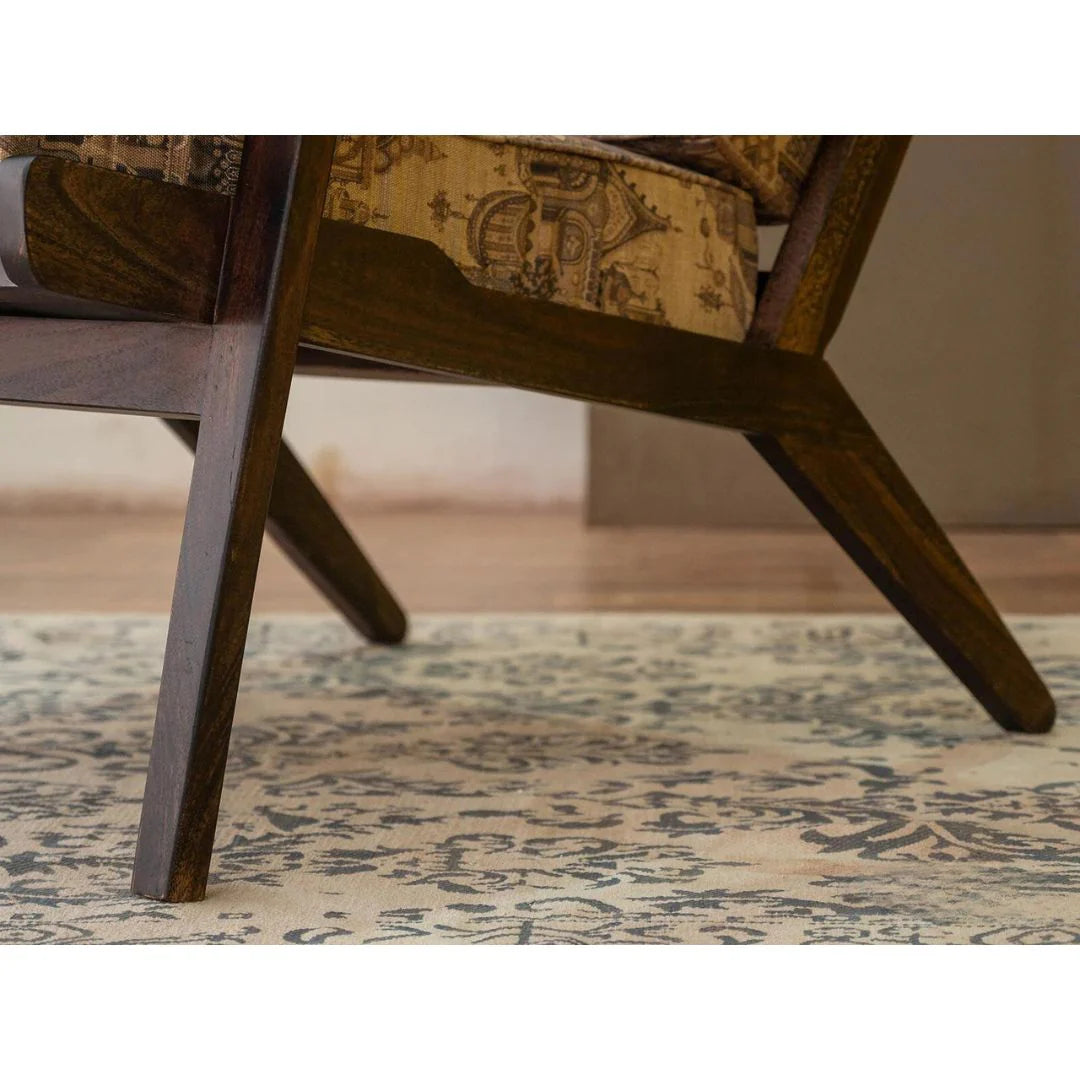 Wooden chair with patterned cushion on a decorative rug